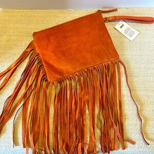 ASOS Suede wristlet w long fringe. Orange/rust color. Gold hardware. Never used.